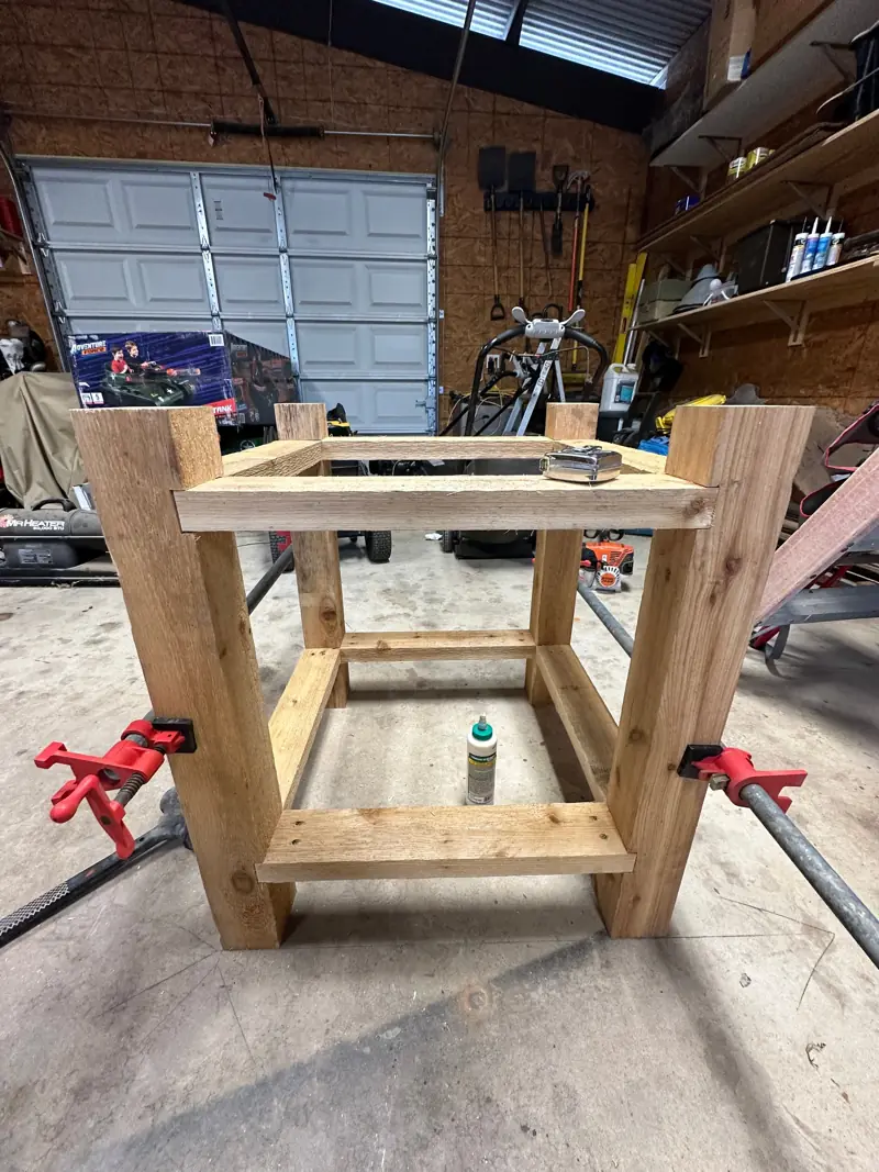 Table base glued and clamped.