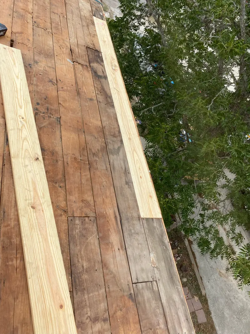New boards laid in where the rotten decking came out.